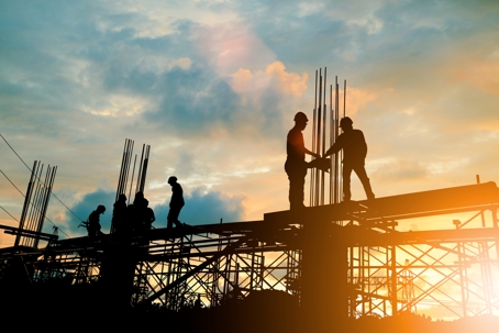 Silhouette of engineer and construction team working.